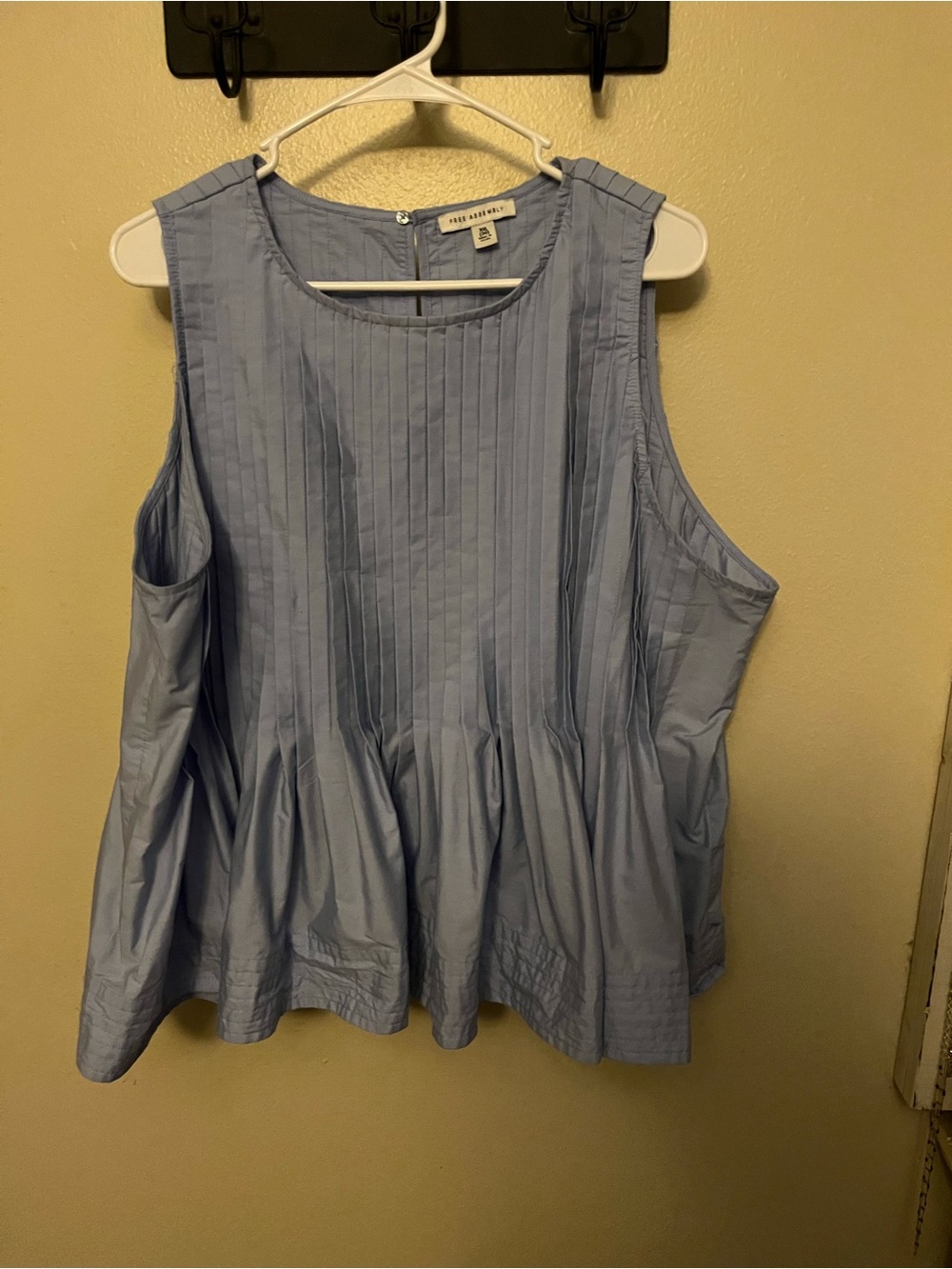Free Assembly Sleeveless Pleated Peplum Top in Light Blue